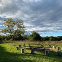 Our fire pit at the top of our land for communal use. The Catskills can be seen in the background 